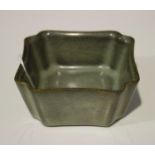 A Chinese Longquan celadon small bowl/brushwasher, of shaped square outline, covered in a lightly