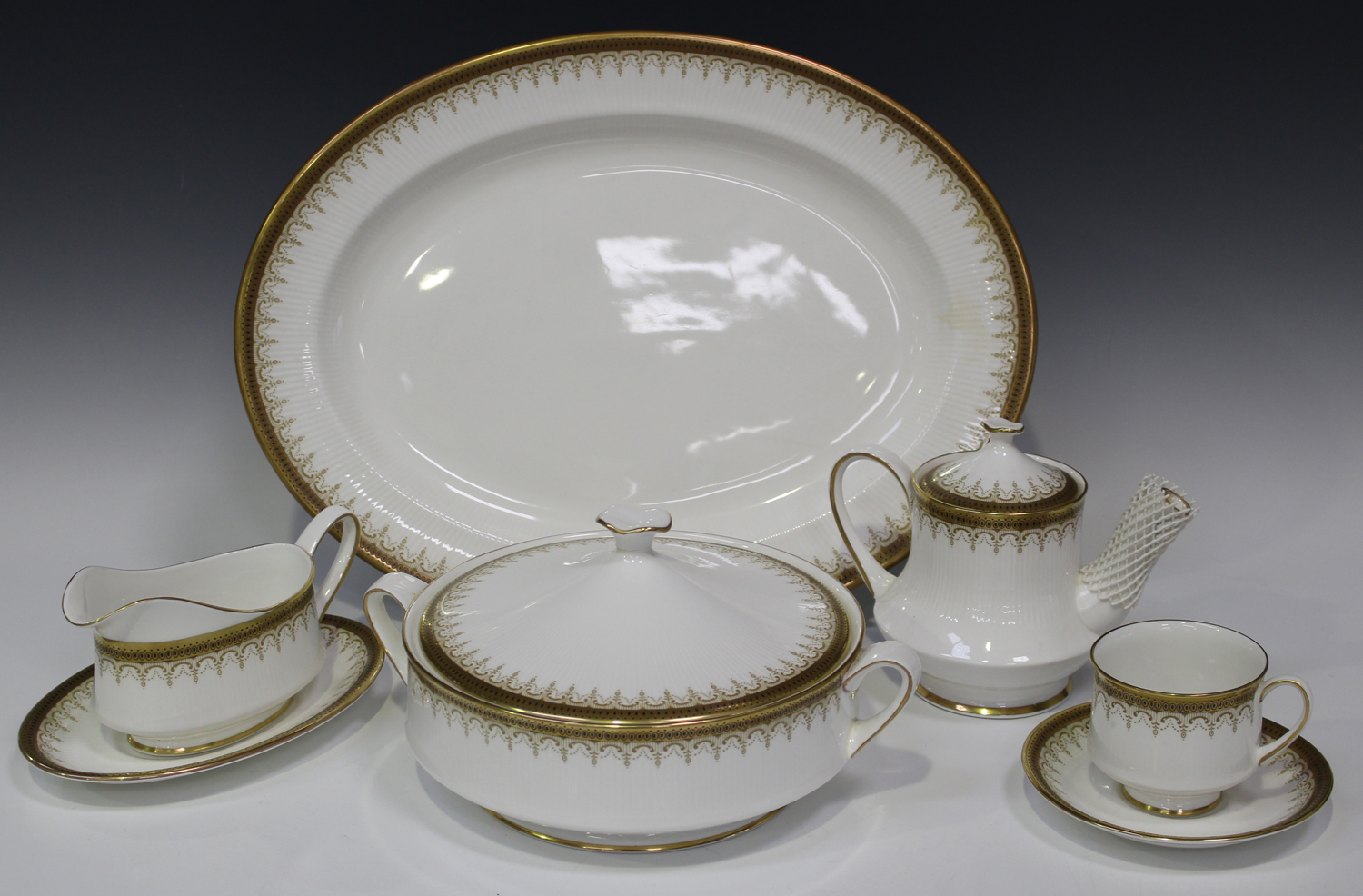 A Paragon bone china 'Athena' pattern part service, comprising oval platter, two tureens and covers,