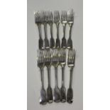 A set of four Victorian silver Fiddle pattern table forks, London 1868 by Chawner & Co, length 17.