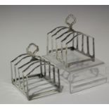 A pair of George VI silver four-division toast racks, Birmingham 1946 by Adie Brothers, length 7.