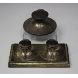 An Edwardian silver mounted twin inkstand, the rectangular base with two circular inkwells, each