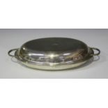 A George III silver oval entrée dish and cover, each with reeded rim and handles, engraved with a