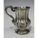 An early Victorian silver christening tankard of hexagonal baluster form, engraved with scrolls