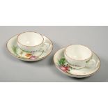 Two Meissen Marcolini period cups and saucers painted with flowers and green leafy fronds, one cup