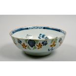 A late 18c/early 19c English Delft bowl, decorated on the outside with a band of polychrome