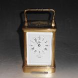 A late 20c striking carriage clock retailed by Garrard & Co, the movement by Epee and having a