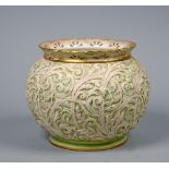 A Grainger & Co Royal Chinaworks Worcester Jardiniere, relief moulded on a lime green ground, gilt