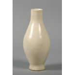 An 18c Chinese white glazed baluster vase moulded in low relief, a/f, 9in h.