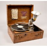 A 1920's Pixie Perophone portable gramophone 'The Grippa' in its oak box with 6in turntable,