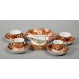 An early 19c Spode part teaset, pattern no.878 and consisting of six cups, six coffee cans, eleven