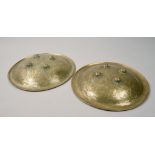 Two Indo-Persian shields, (Dhal) of circular form, brass faces engraved with animals, birds and