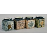 Four Troika cubed vases in shades of blue and brown, each factory and artist signed to base, each