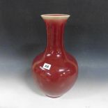 A 19c Chinese copper/red glazed baluster vase, 16in h.