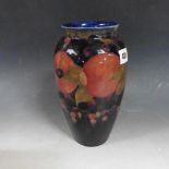 A 1930's Moorcroft Pomegranate vase of baluster form, 9.5in h.