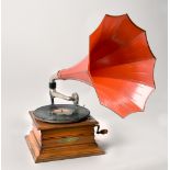 A 1920's American gramophone by the International Zonophone Co. in a stepped timber case with 10in