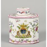 An 18c Strasbourg Armorial tea cannister of canted rectangular form with cover, all painted with