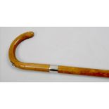 A Brigg of London sporting bamboo walking stick with silver band, the handle containing a pull out