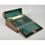 A Victorian figured walnut table top writing box with brass Gothic tracery mounts, opening to reveal