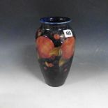 A 1930's Moorcroft Pomegranate vase of baluster form, 9.75in h.