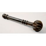A 19c carved wood throwing club with turned wood handle, 12in l.