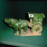 A Chinese green glazed ox cart, 12in w, 6.25in h.