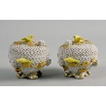 A pair of 19c Meissen Schneeballen bowls and covers applied with yellow birds and gilt trailing