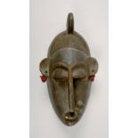 An African carved wood face mask, 14in h.