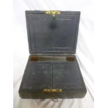A Victorian Morocco leather travelling writing slope by Stringer of London with fitted interior