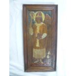 A painted carved wood rectangular panel depicting a religious figure,