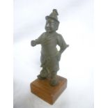 An Eastern bronze figure of a standing male,