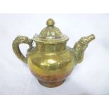 An old Eastern brass and copper kettle,