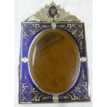 An unusual 19th Century Venetian-style bevelled oval easel dressing mirror in blue tinted glass