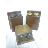 Three mahogany cased twin wall bell sets