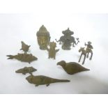 Six various tribal bronze figures of fish and birds together with an unusual bronze figure on