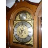 An early 19th Century longcase clock with 13" brass and silvered arched dial by John Dickman of