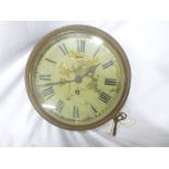 A good quality ship's wall clock with painted circular dial in brass cylindrical case