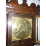 An 18th Century longcase clock with 11" brass square dial by Dalton of Rugby,