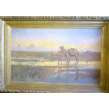 R Wellesley Webster - oil on canvas A view of Cairo with flooded landscape and camels in the