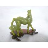 An Eastern jade figure of two horses,