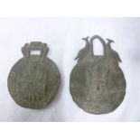 Two early lead horse harness ornaments depicting regal figures and script