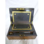 A Victorian brass mounted figured walnut rectangular writing slope with fitted interior