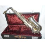 A good quality silver plated saxophone by Chas.E.Foot Ltd London & Paris No.