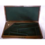 A good quality 20th Century brass mounted mahogany pistol case with baize-lined interior,