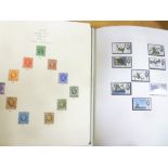 An album containing a selection of GB stamps, 1934 onwards including Commemorative,