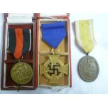 A German Second War Nazi 40 year Service medal in original box,