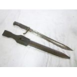 A First War German Mauser G98 bayonet with single edged steel blade in steel scabbard with leather