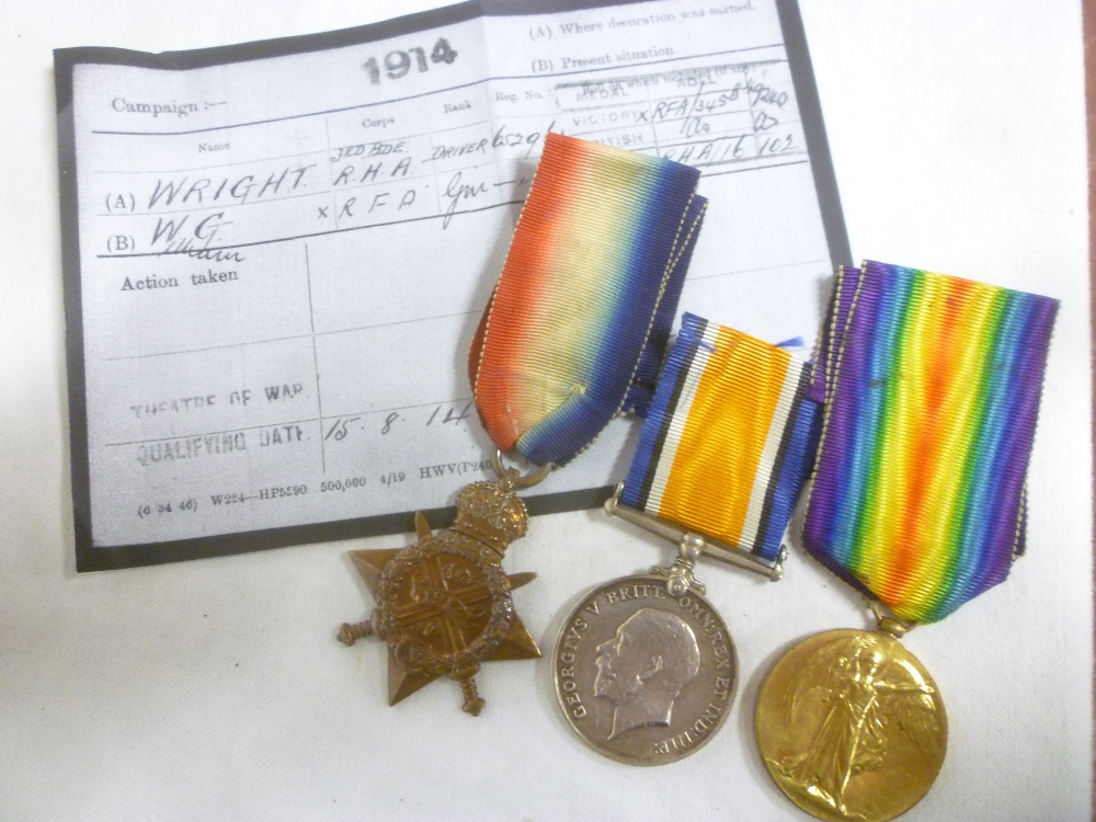 A 1914 Star trio of medals awarded to No.65296 Dvr./Gnr.W.G. Wright R.H.A./R.A.