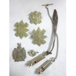 A small selection of military badges including Black Watch,