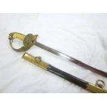 A German Second War Kriegsmarine Officers sword with pipe-backed single edged blade,