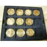 10 Portuguese silver commemorative crown-size coins in fitted case